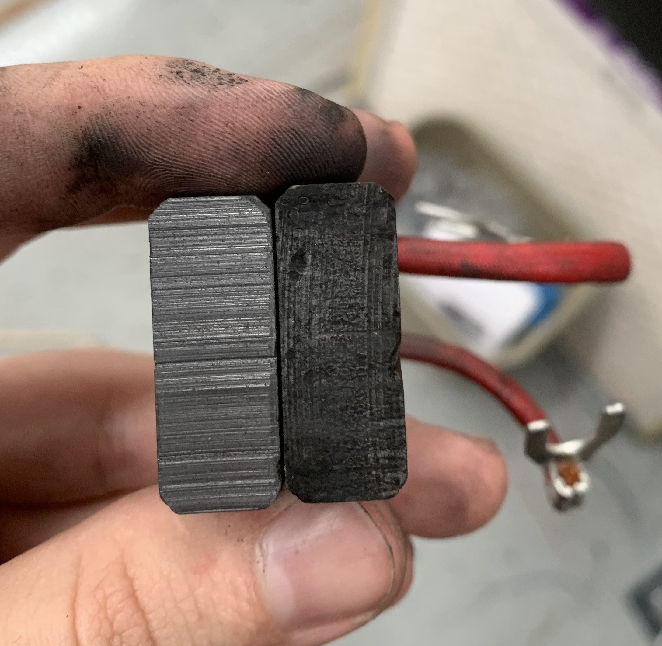 A good brush with worn face on the left, and the stuck brush with a fresh face on the right.