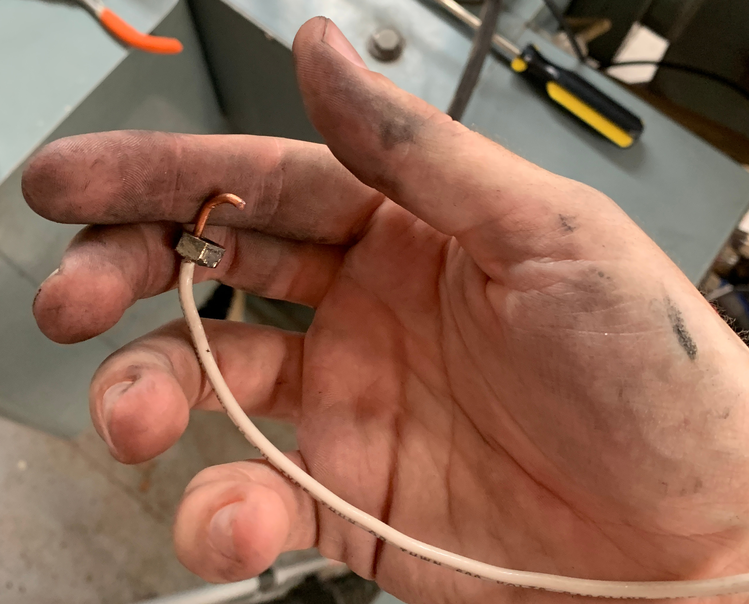 The nut on my wire hook after I carefully fished it out.